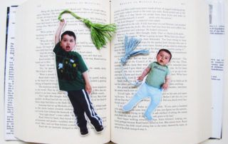 Fun photo bookmark featuring adoptee hanging from tassel.